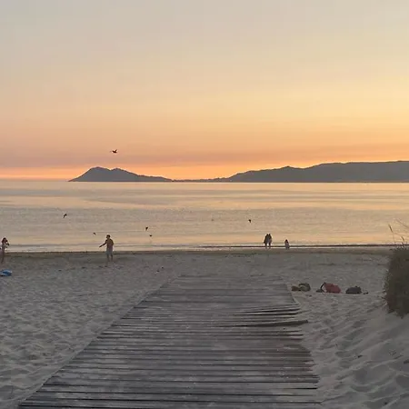 Сasa de vacaciones Adosado Portosin Con Piscina Al Lado De La Playa